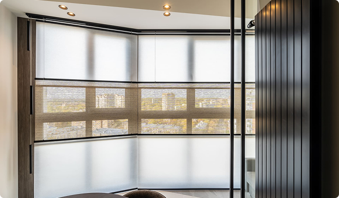 Bay window with white translucent Flow blinds in horizontal bands and a city view